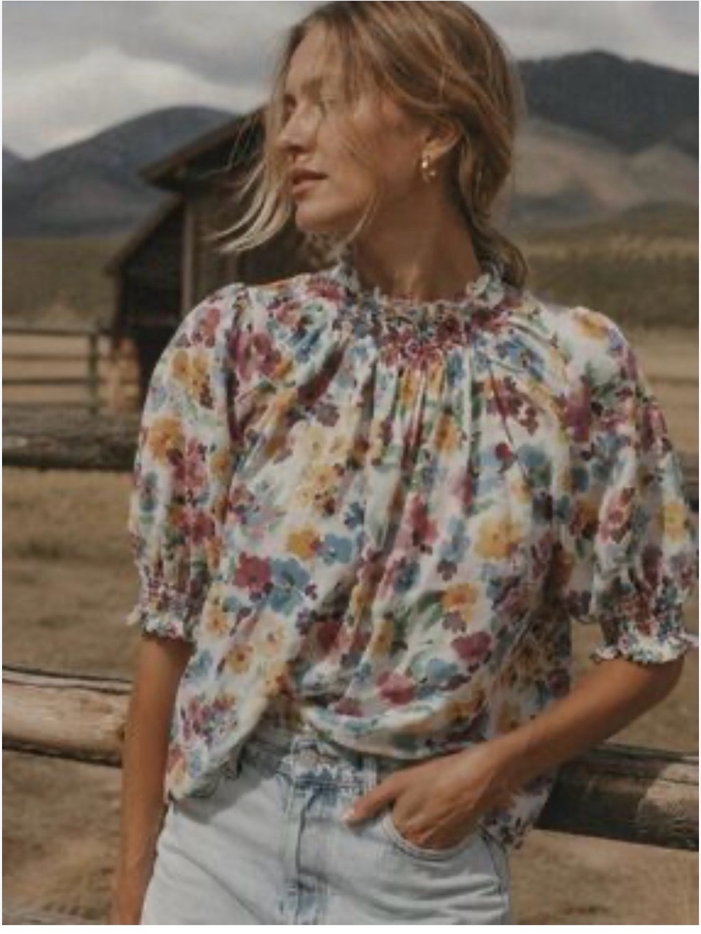 THE GREAT. Floral Smocked Neck Blouse in Cream with Blue, Pink & Yellow Accents
